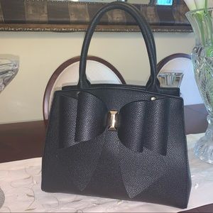 New Black Crossing New York Bow Satchel Handbag.